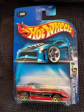 Hot Wheels Red Sports Car Toy with Gold Wheels
